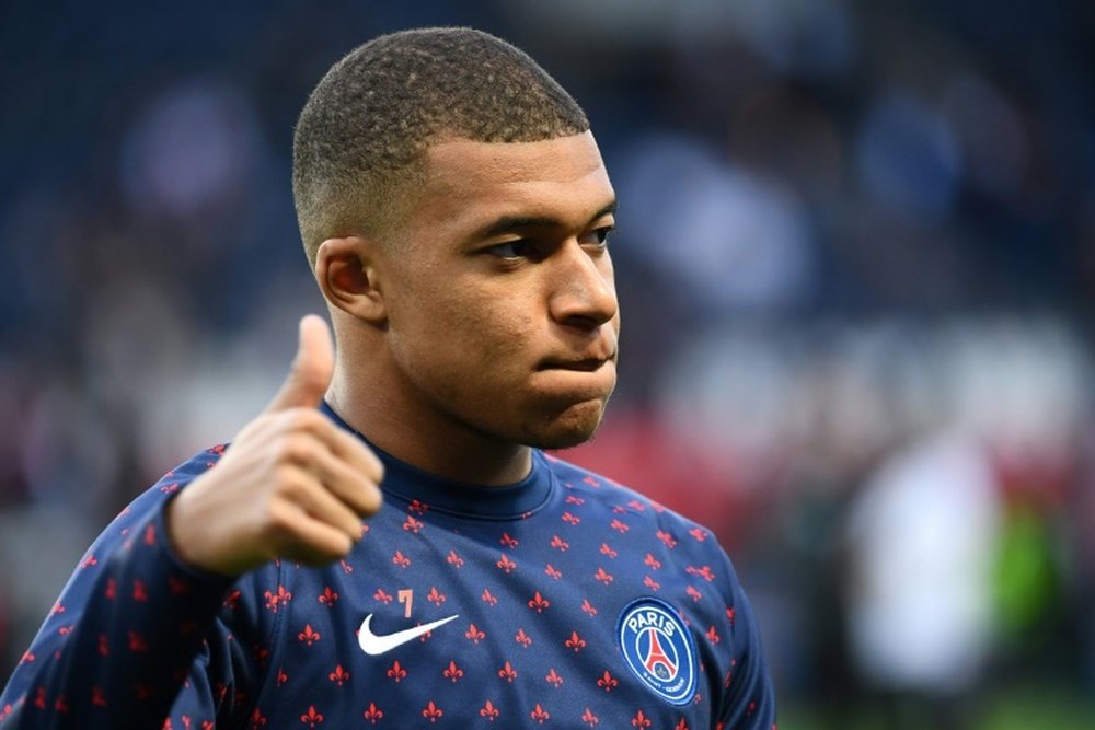 Mbappe hinted at a possible PSG departure if he does not get more responsability. AFP