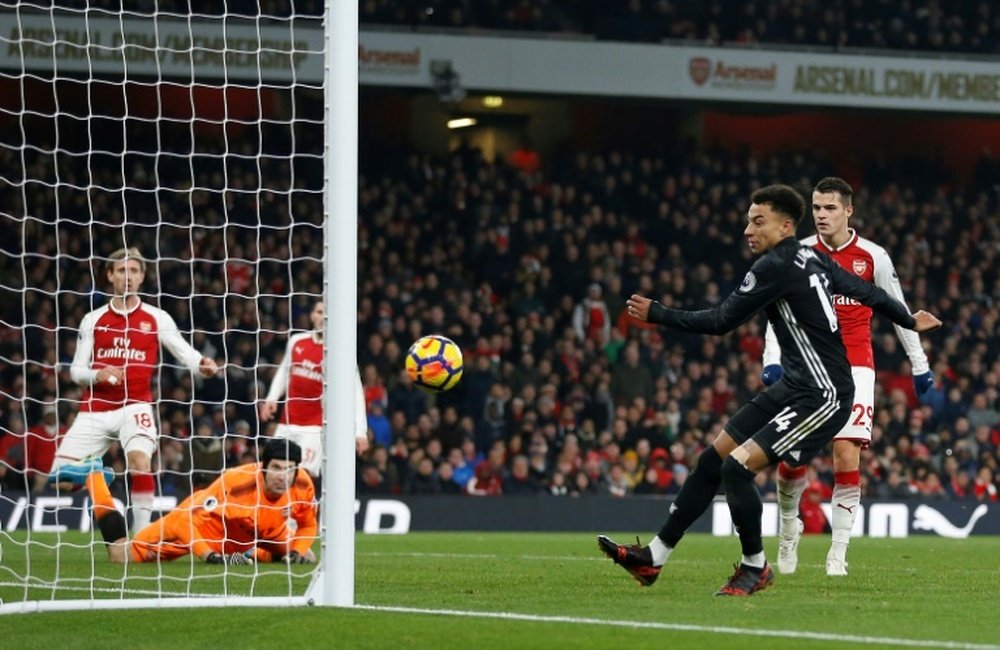 Lingard scores his second and United's third against Arsenal. AFP
