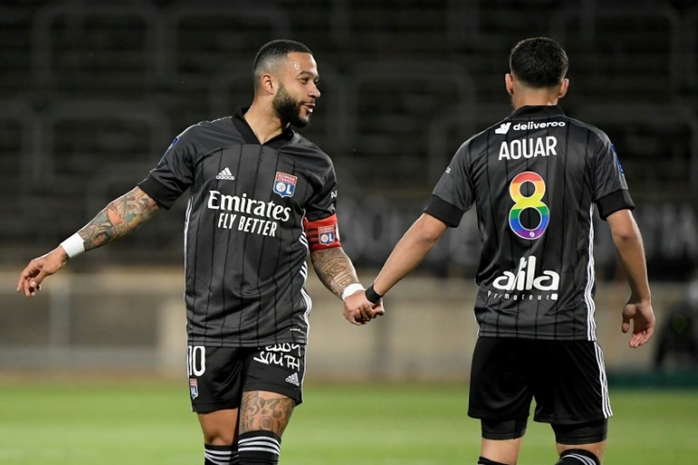 La joie du milieu de terrain de Lyon, Houssem Aouar, après son but marqué contre Nice, lors de leur match de L1, le 19 décembre 2020 à l'Allianz Riviera