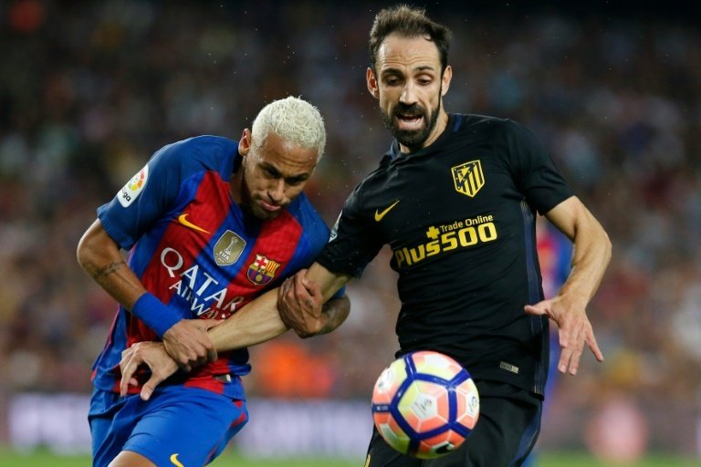 Juanfran se souvient de ses duels avec Neymar. AFP
