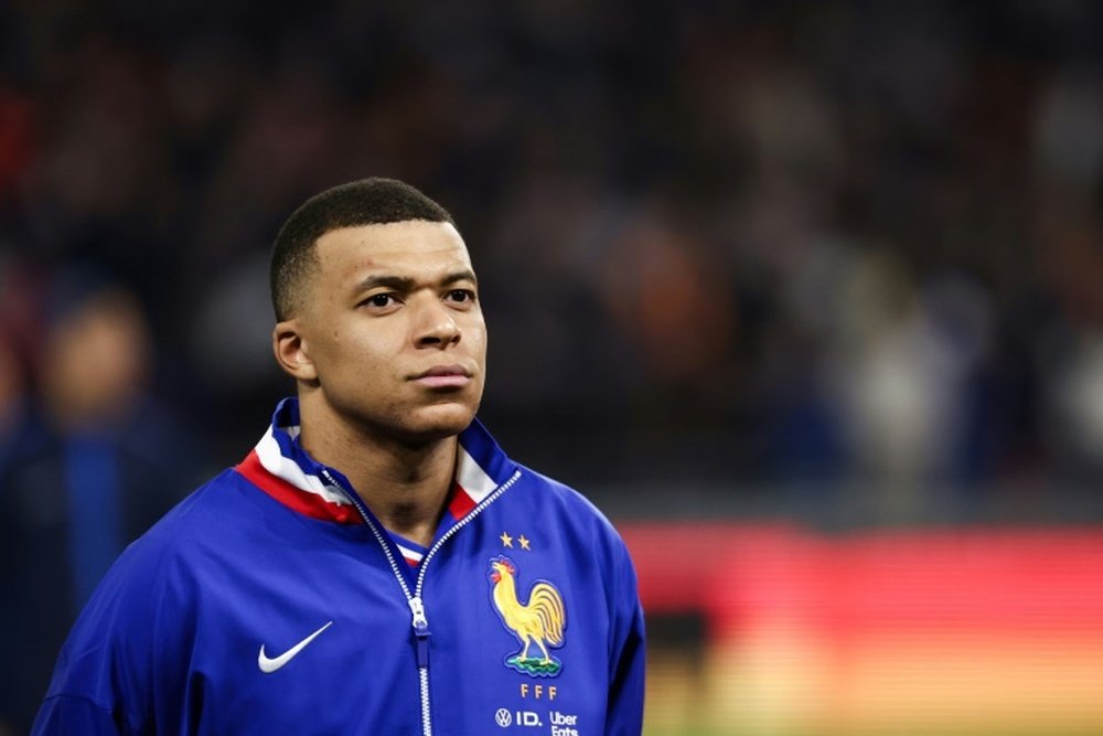 Mbappe wants to play in the Paris Olympics. AFP