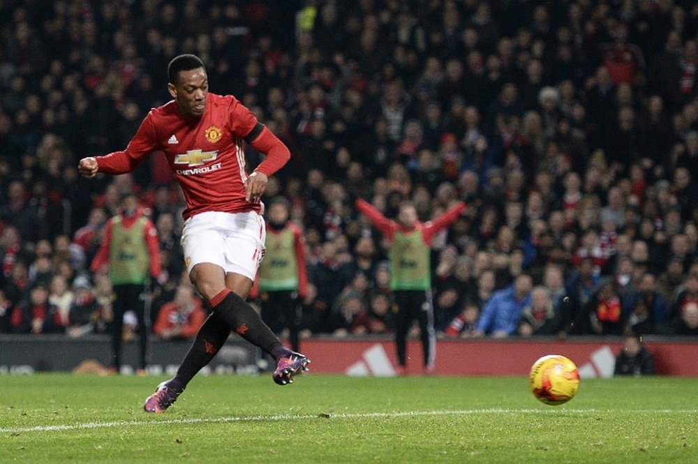 Martial scored only eight PL goals for United last season. AFP
