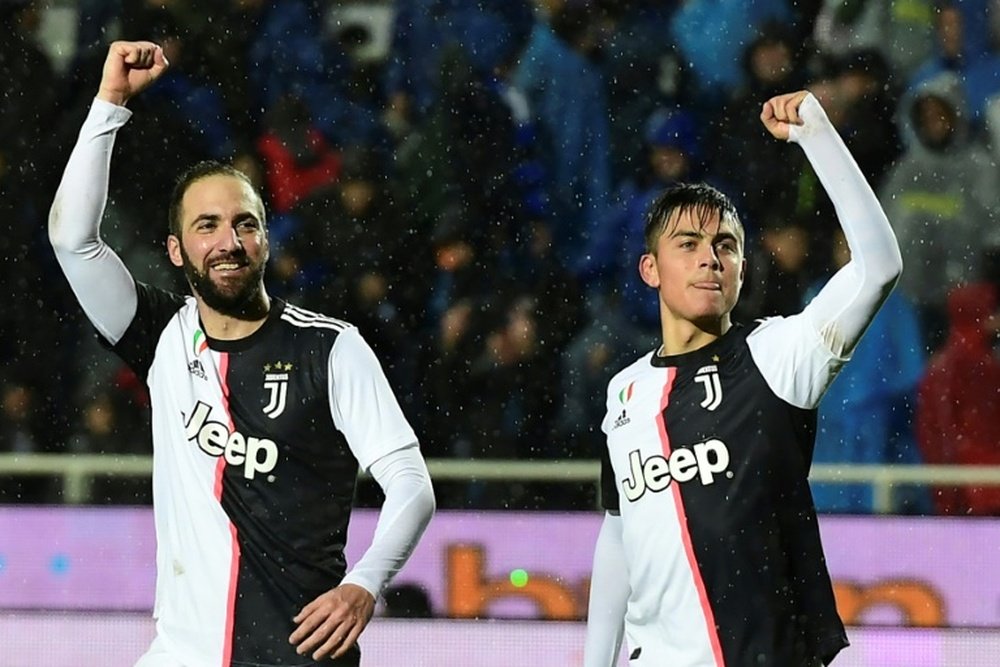 Cristiano marcó, pero Higuaín quiso destacar la labor de Dybala. AFP