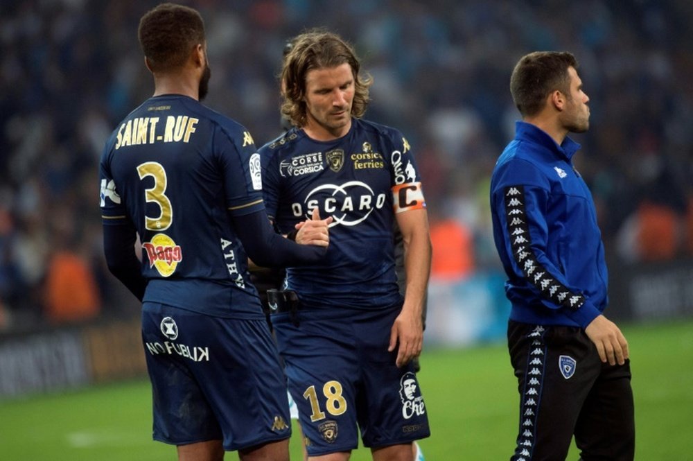 La détresse des joueurs du SC Bastia défaits à Marseille, après la relégation sportive du club. AFP