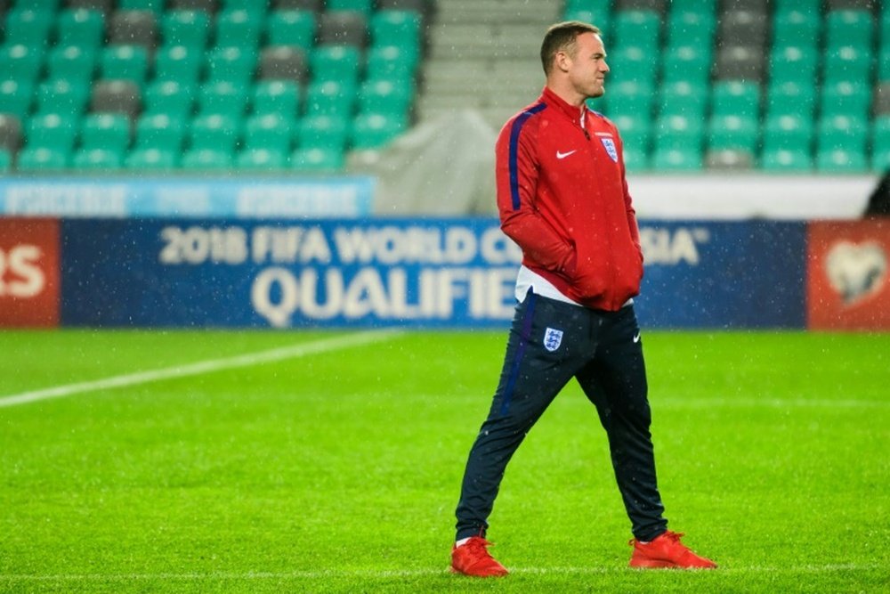 Wayne Rooney, más que cuestionado en el United y en Inglaterra. AFp