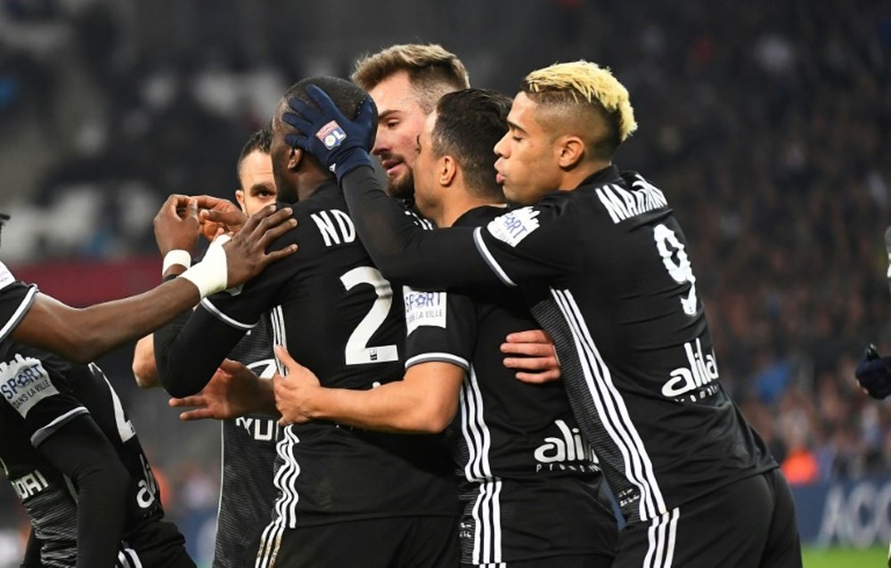 Lyon vence Marseille no Vélodrome. AFP