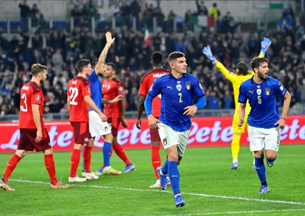 Le défenseur italien Giovanni Di Lorenzo (#2) vient d'égaliser pour la Squadra Azzurra. AFP