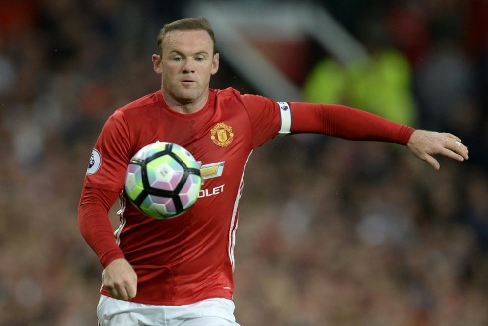 Rooney will be given a go in a more familiar number nine role. AFP