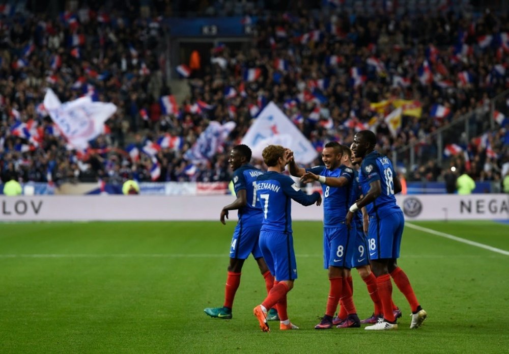 La joie des joueurs de l'équipe de France après le but de Dimitri Payet. AFP