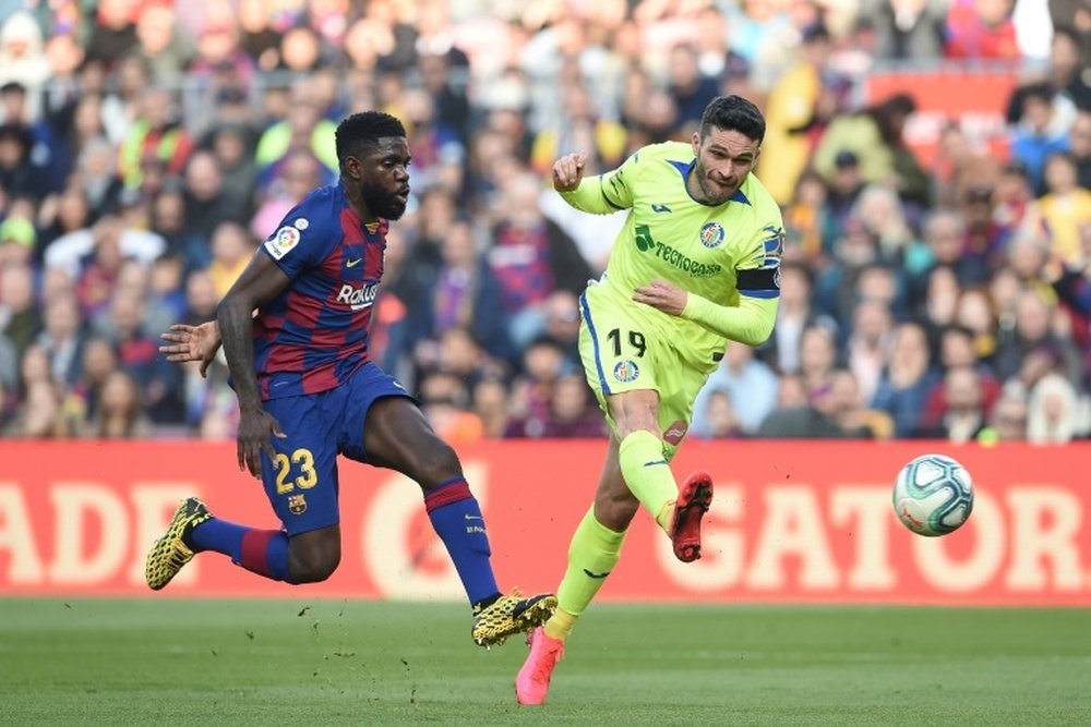 Samuel Umtiti (L) has hardly played recently. AFP