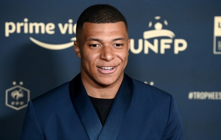 Mbappe said in the ceremony that he will announce his decision very soon. AFP