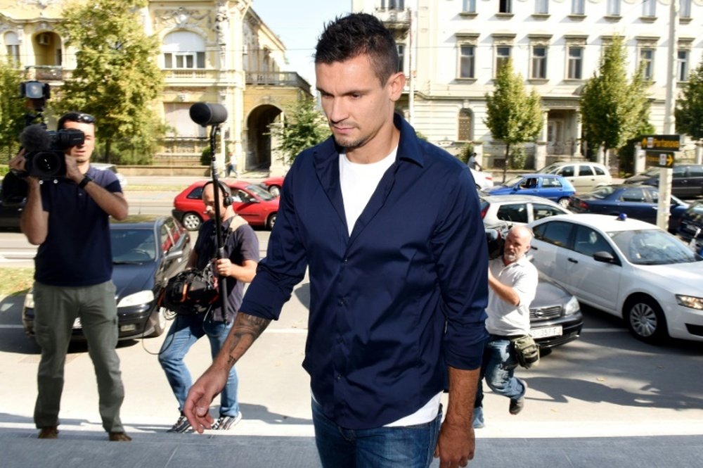 Le défenseur de Liverpool, le Croate Dejan Lovren, arrive au tribunal de Osijek en Croatie. AFP