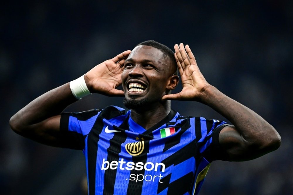 Marcus Thuram wants to stay at Inter despite Liverpool interest. AFP