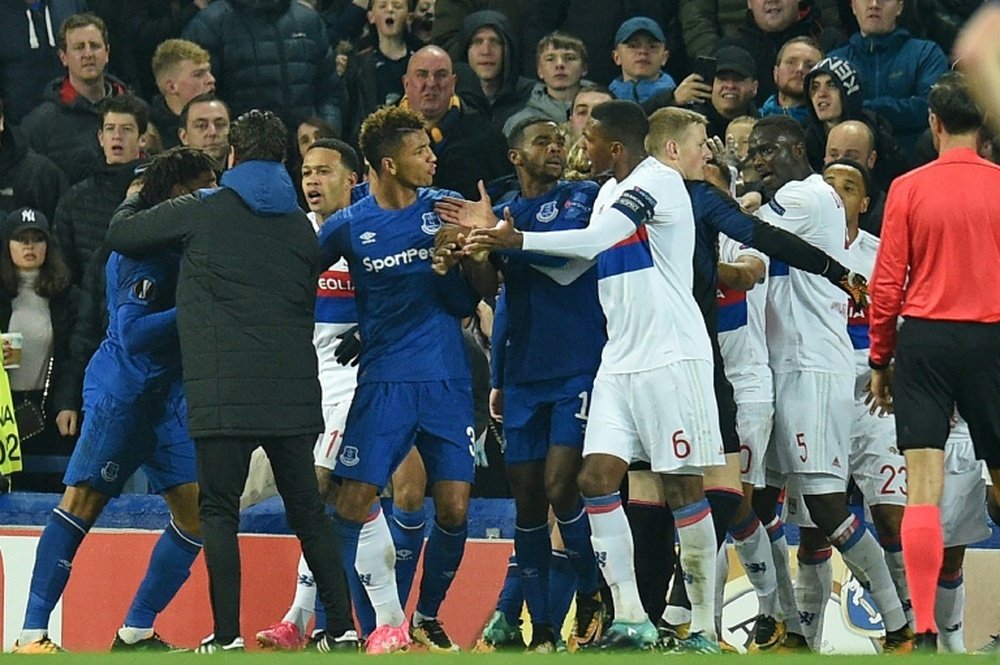 The Europa League clash between Everton and Lyon was disrupted by crowd trouble. AFP