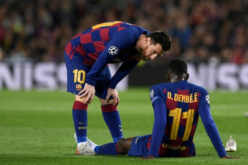 Dembele facing 10 weeks out with thigh injury. AFP