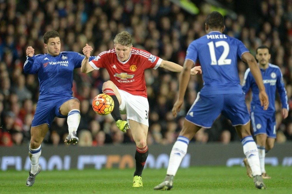 Schweinsteiger (C) in action for United against Chelsea last season. AFP