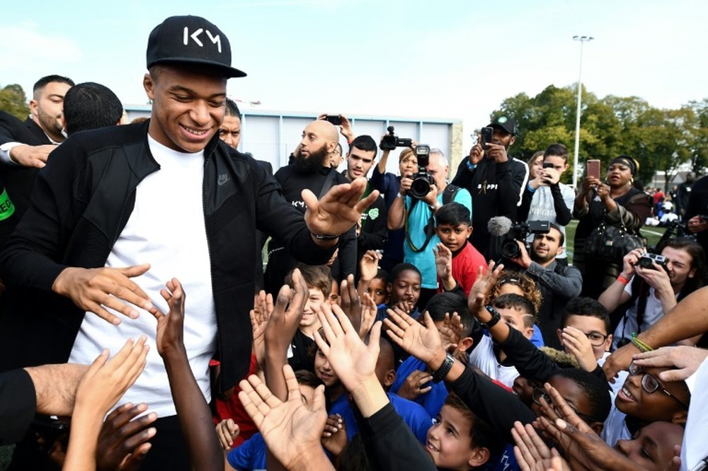 Mbappe was welcomed back to hometown Bondy. AFP