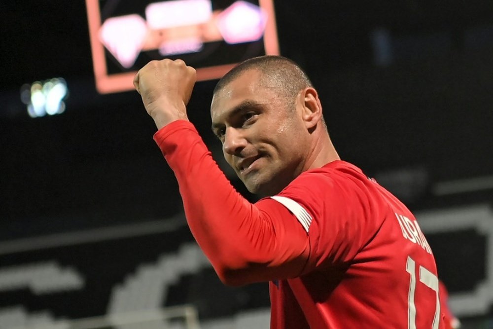 Burak Yilmaz, opción para el ataque del Milan. AFP