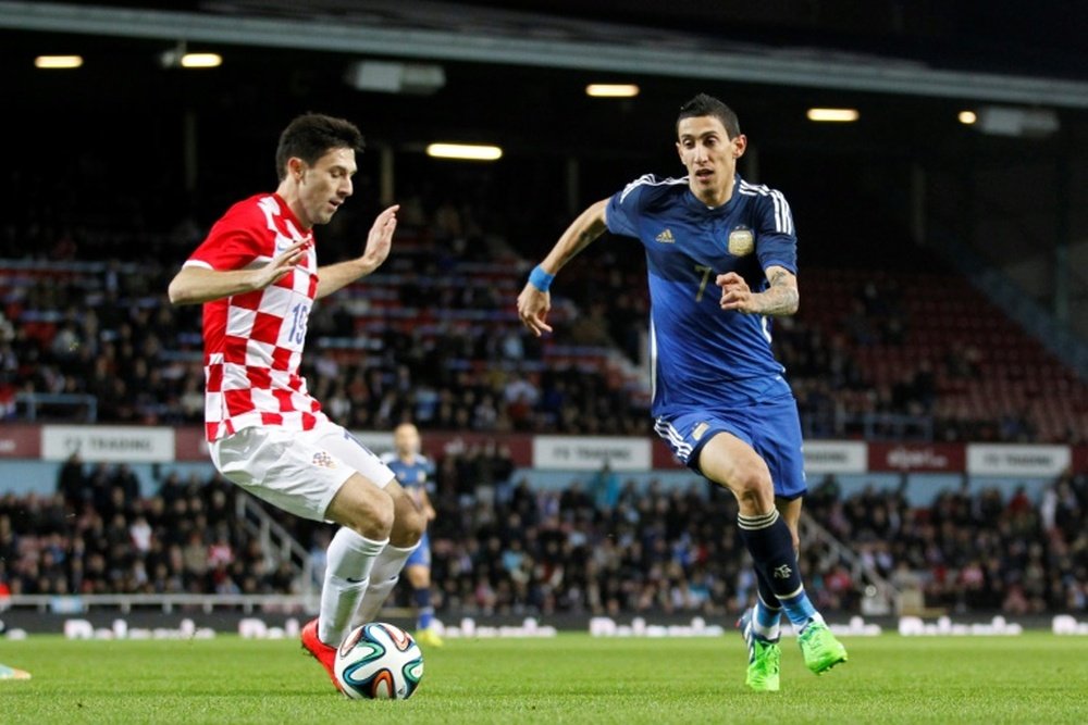 Hrvoje Milic, avec la Croatie contre l'Argentine dAngel Di Maria en match amical à Londres. AFP