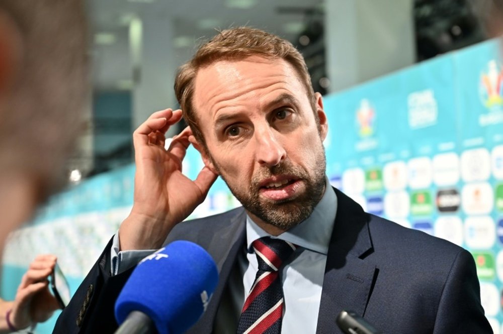 Southgate happy to have selection headache after England's youngsters make history. AFP