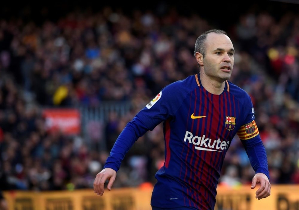 Iniesta has been linked with an end-of-season move away from Barcelona. AFP