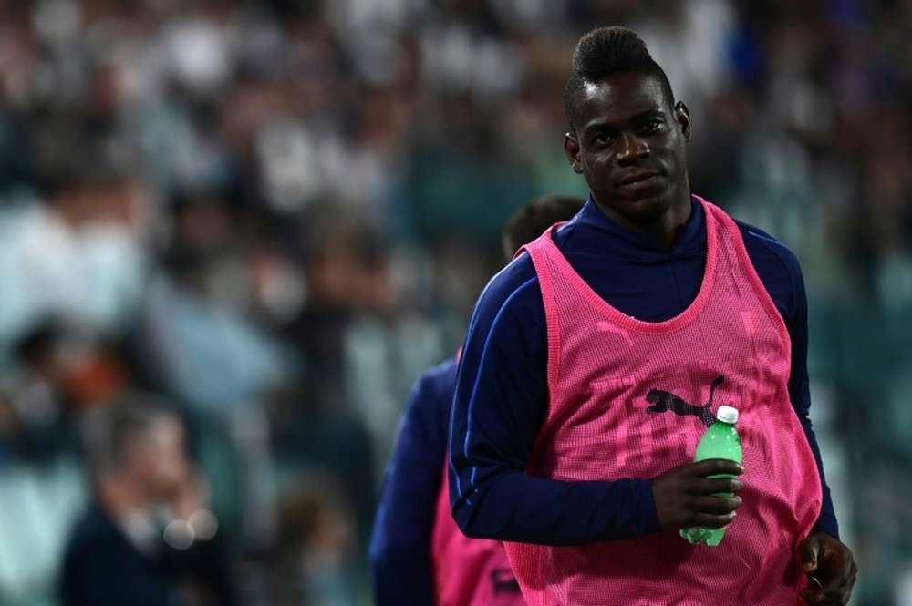 Balotelli has recently got back in to the Italian national squad. AFP