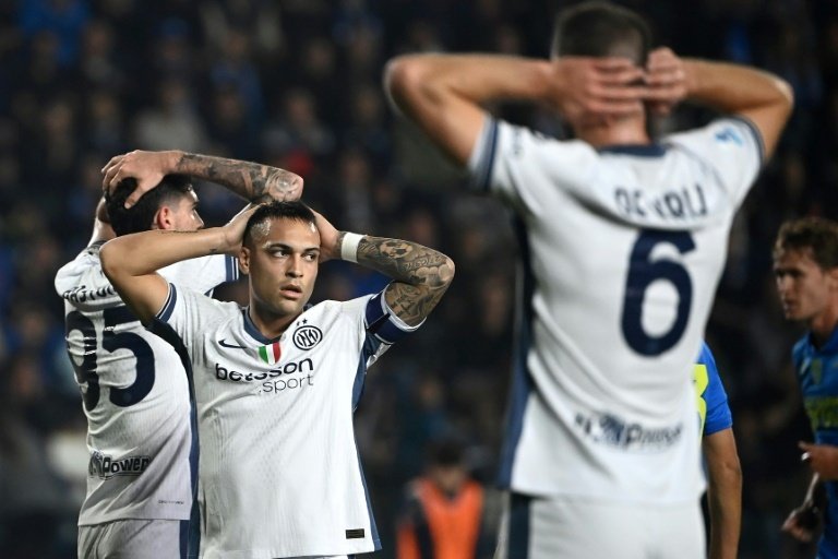 Lautaro and Dumfries will both miss the game against Udinese. AFP