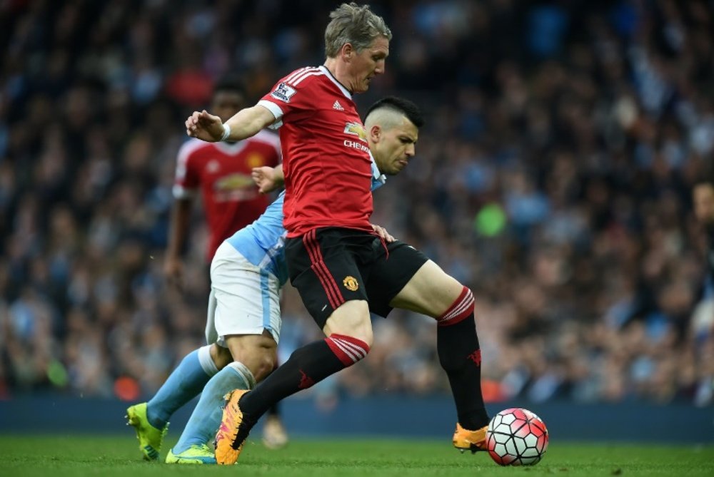 Schweinsteiger in action for United in the Manchester derby. AFP