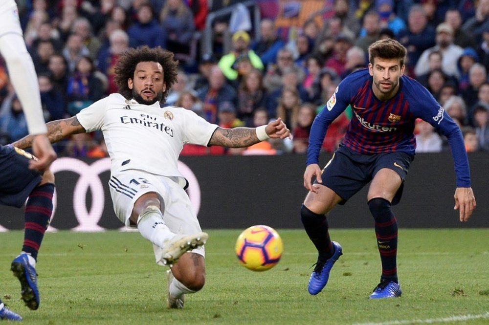 Marcelo et Piqué se retrouveront au Bernabéu. AFP