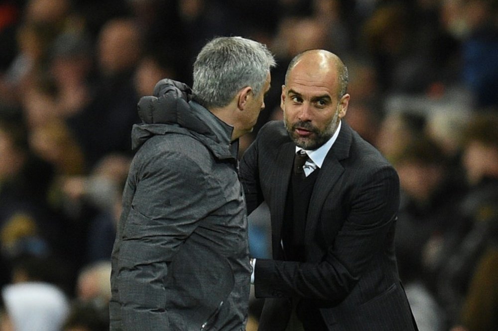 Guardiola: Title race not over. AFP