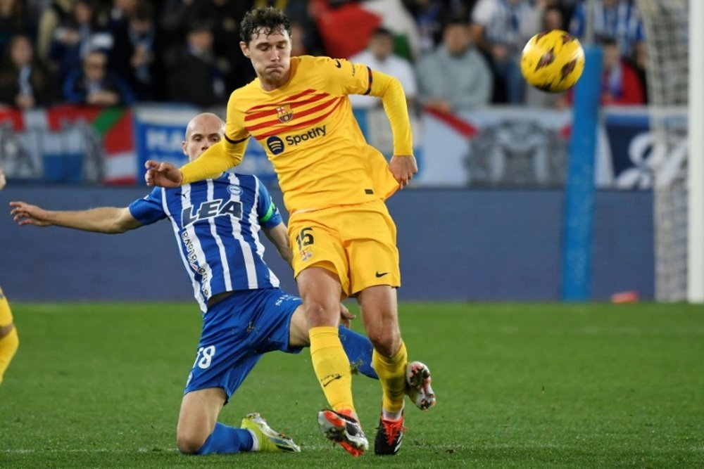 Christensen (R) has played both centre-back and midfield for Barcelona. AFP