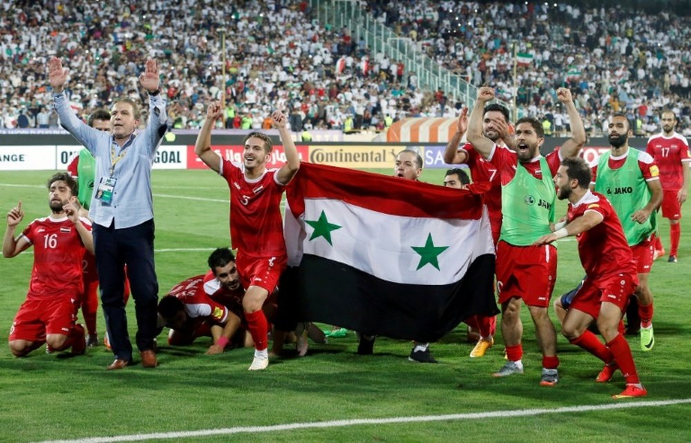 Les joueurs syriens en liesse après avoir décroché un ticket pour un pré-barrages. AFP