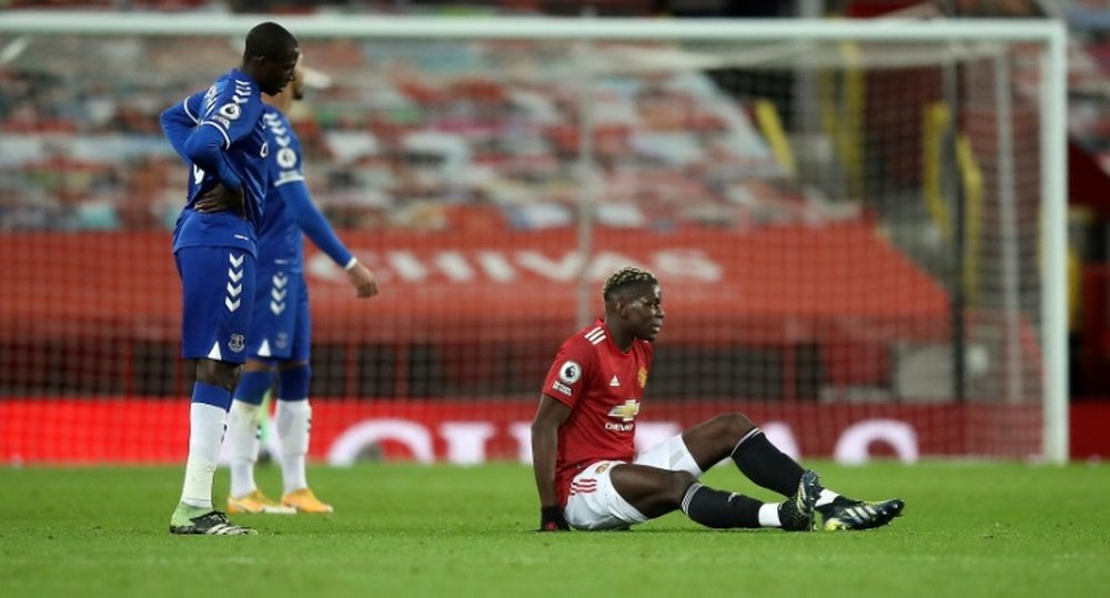 Paul Pogba may not be able to stay at Man Utd. AFP