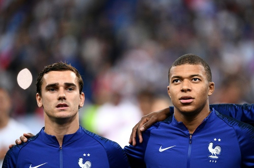 If Griezmann signs for PSG, Mbappe may have to leave the club. AFP