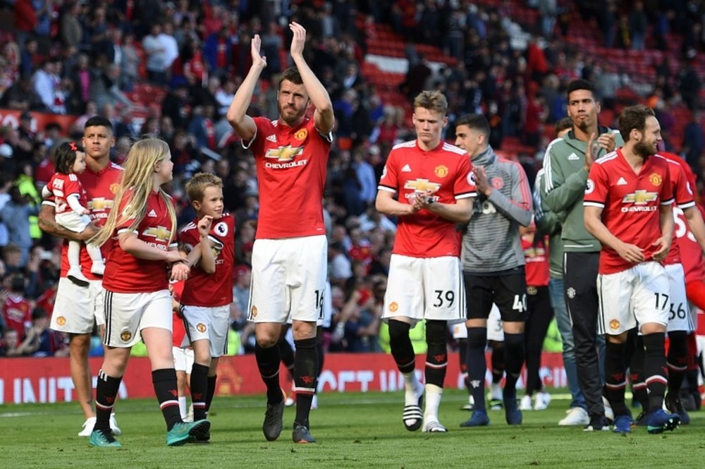 Manchester United communie avec leurs supporters à l'issue du dernier match de la saison. AFP