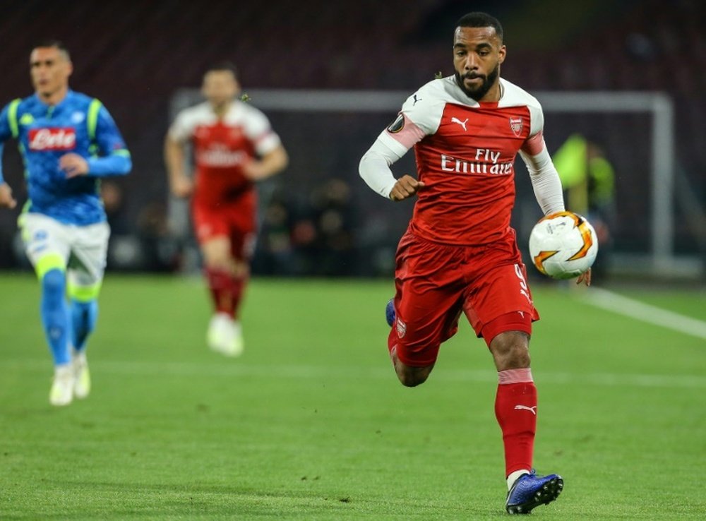 Barcelona are interested in signing Lacazette. AFP