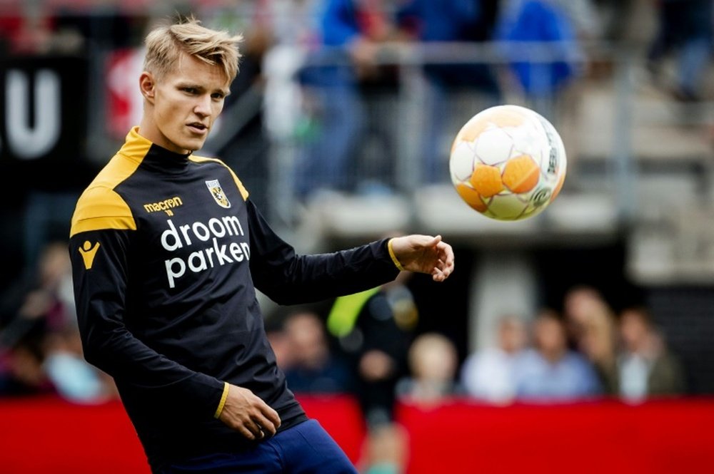 Odegaard compared to Eriksen in Norway. AFP