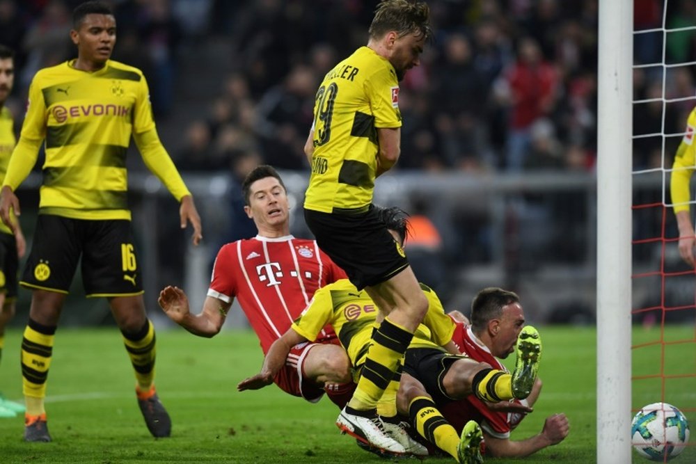 Prováveis escalações de Bayern e Borussia. AFP