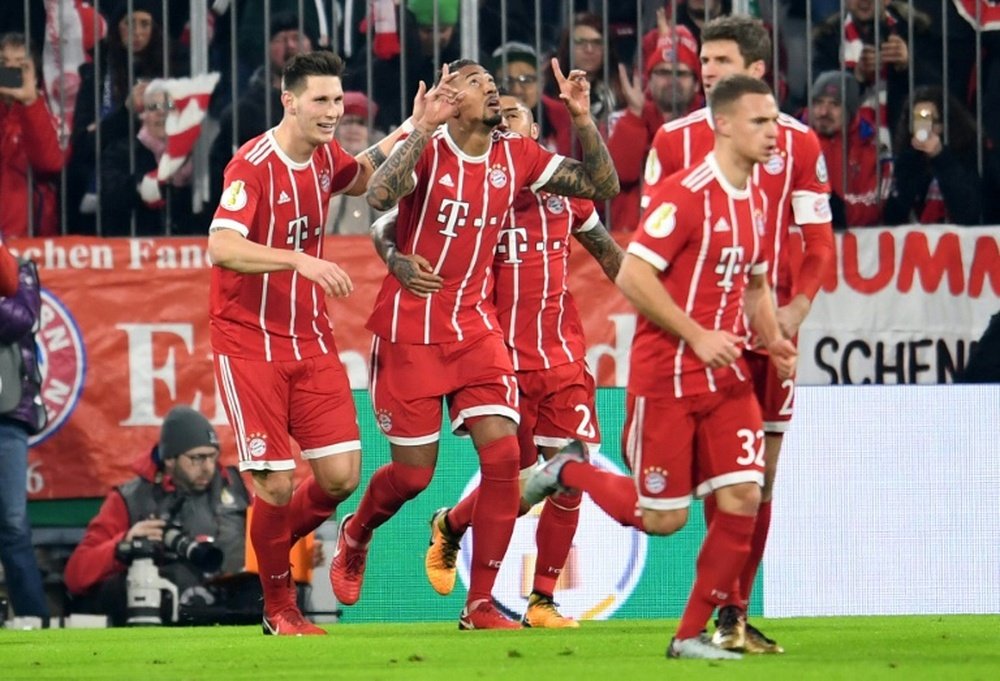 Les joueurs du Bayern se congratulent après un but de Jerome Boateng. AFP