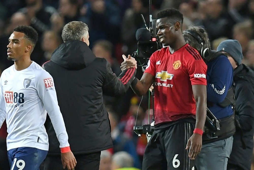 Solskjaer admitted Pogba will play a lot more with United. AFP