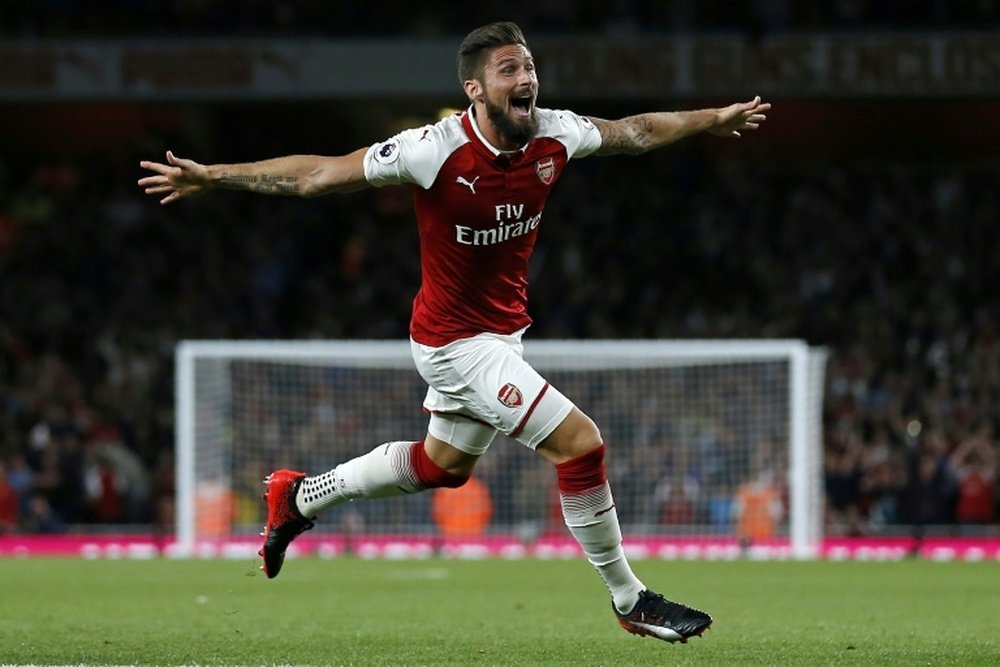 Giroud almost left Arsenal during the summer. AFP