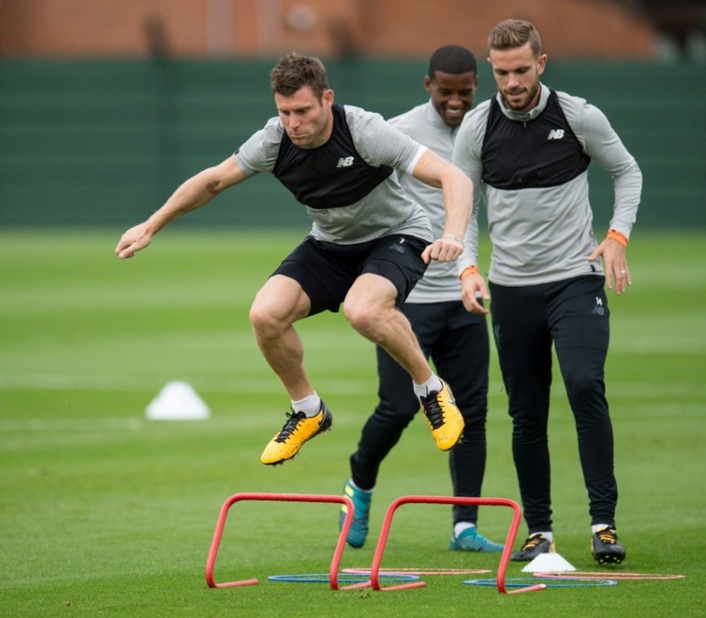 Midfielder James Milner will return earlier than expected after overcoming a hamstring issue. AFP