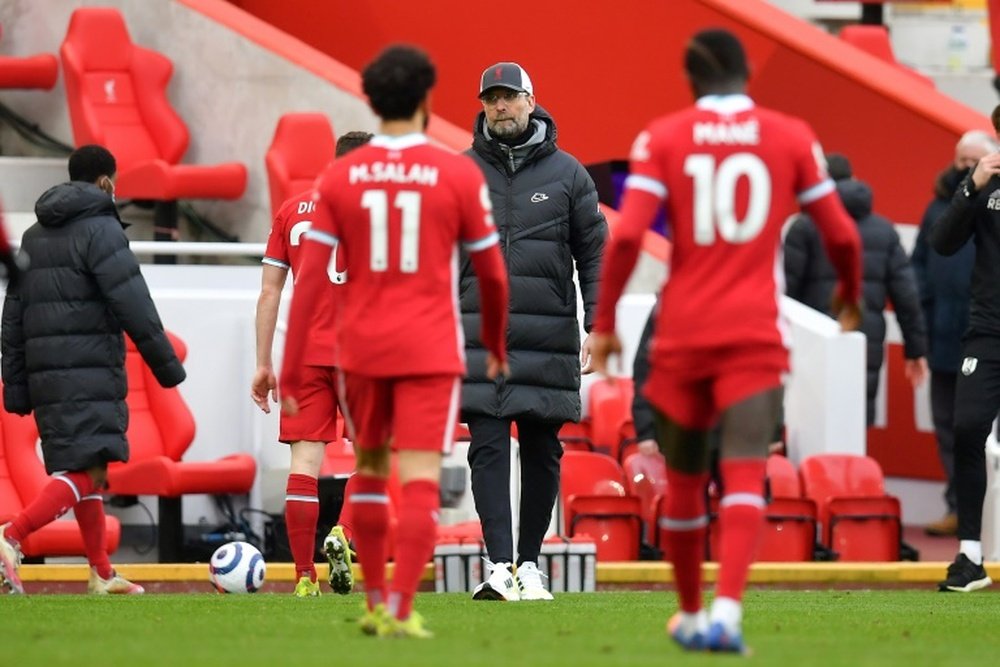 Jurgen Klopp believes the flag should be raised immediately if it's offside. AFP