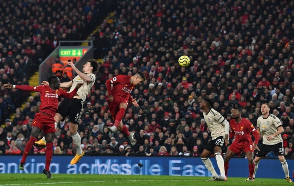 Liverpool e Manchseter United deram novo passo na volta do futebol. AFP