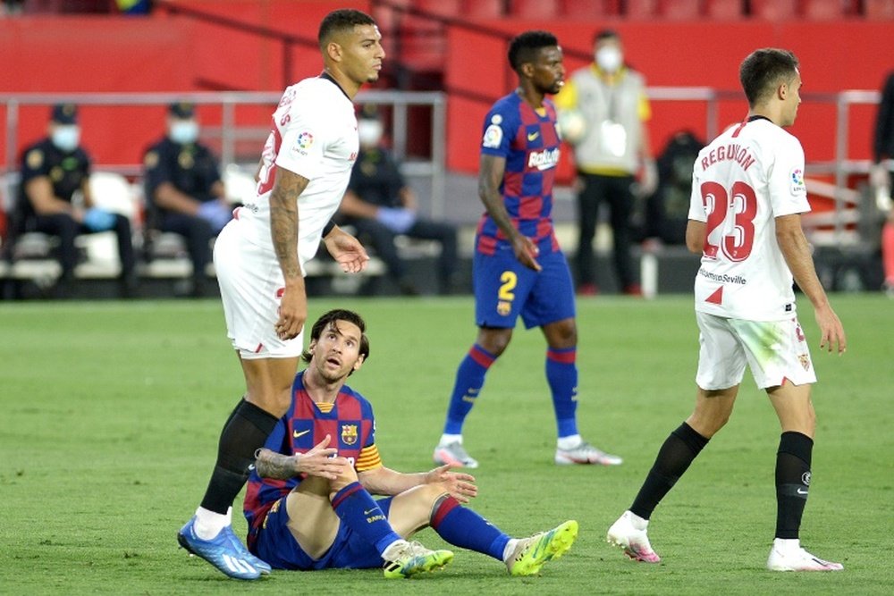 A tensão entre Messi e o Barça. AFP