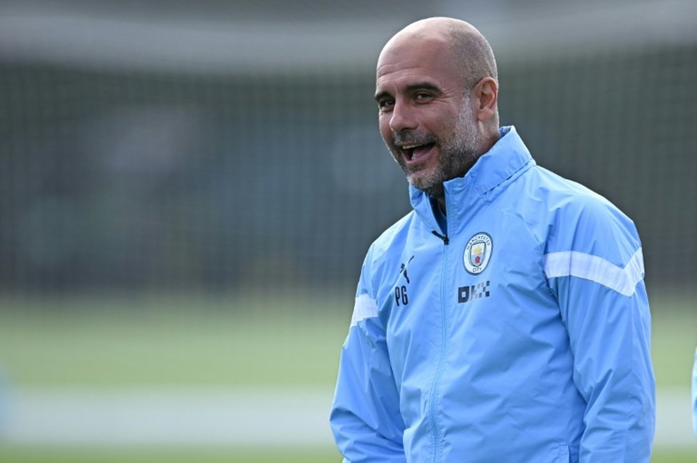 Pep Guardiola has renewed his contract until 2025. AFP