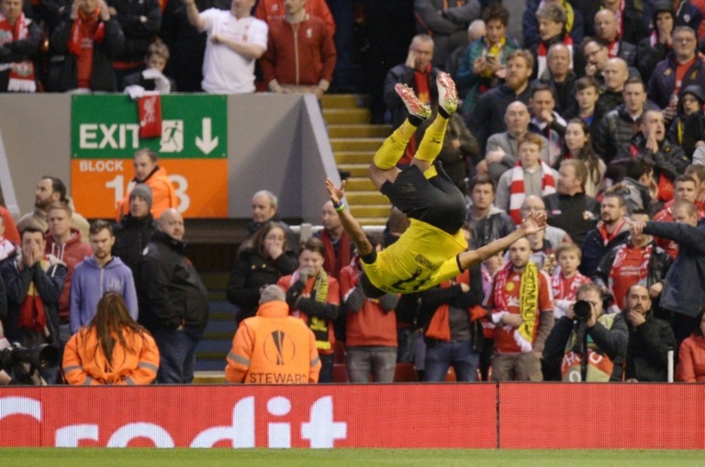 Pierre-Emerick Aubameyang, attaquant de Dortmund, célèbre un but face à Liverpool en C1. AFP