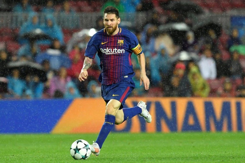 La star de Barcelone Lionel Messi contre l'Olympiacos FC au Camp Nou. AFP