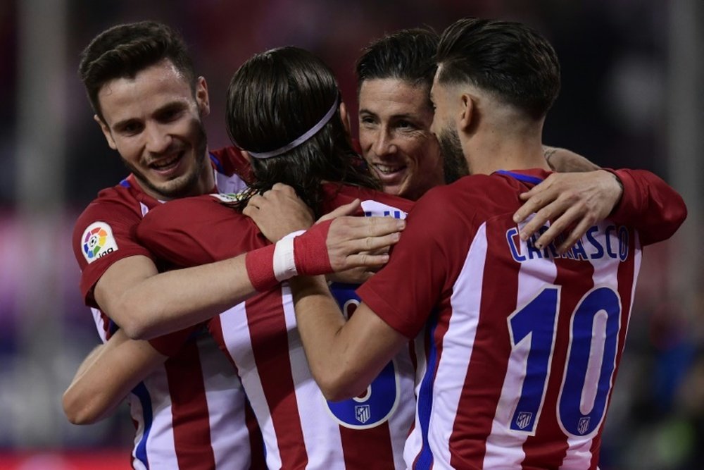 La joie des joueurs de l'Atlético Madrid après le but du défenseur Filipe Luis. AFP