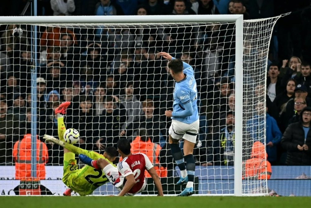 Stones apologised to the Man City fans after their humbling at the hands of Arsenal. AFP